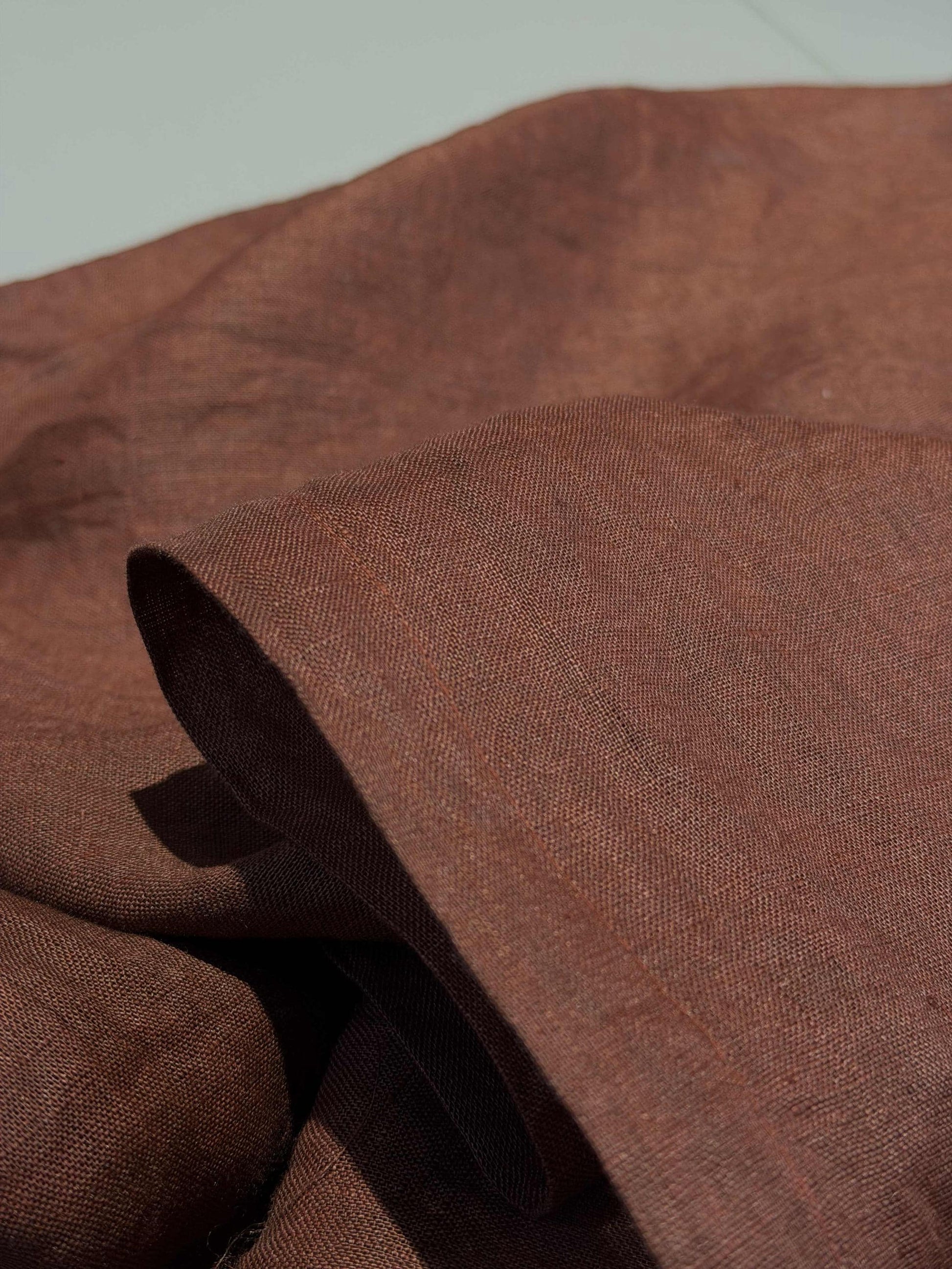 detail view of Linen Panel — Crimson Blue showing plant-dyed fabric texture and pattern