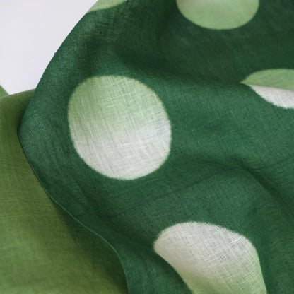 close-up of Polka Dot Linen Noren — Sage / Green showing the natural resist-dye motif on linen