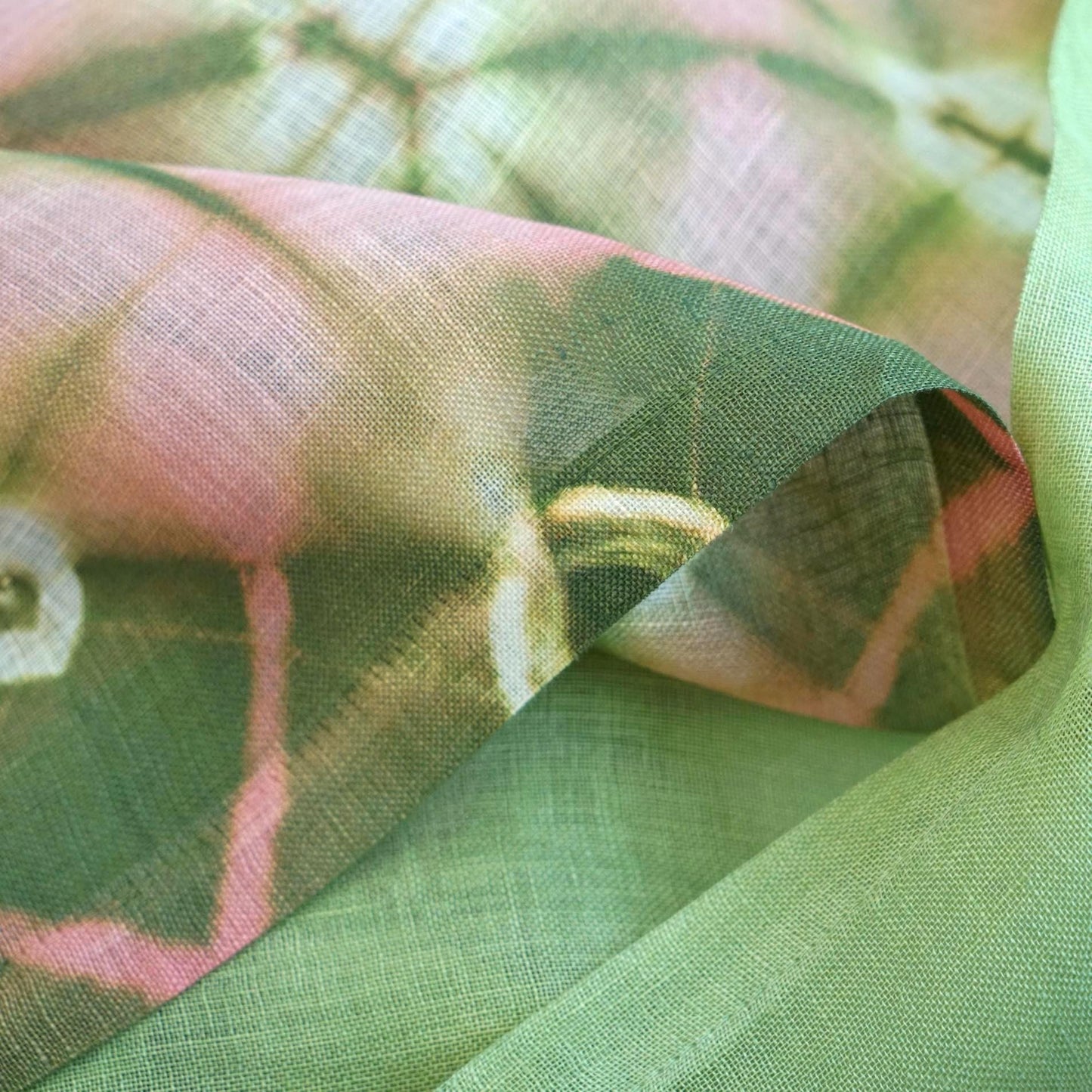 detail view of Motif Linen Noren — Peach showing plant-dyed linen texture and pattern