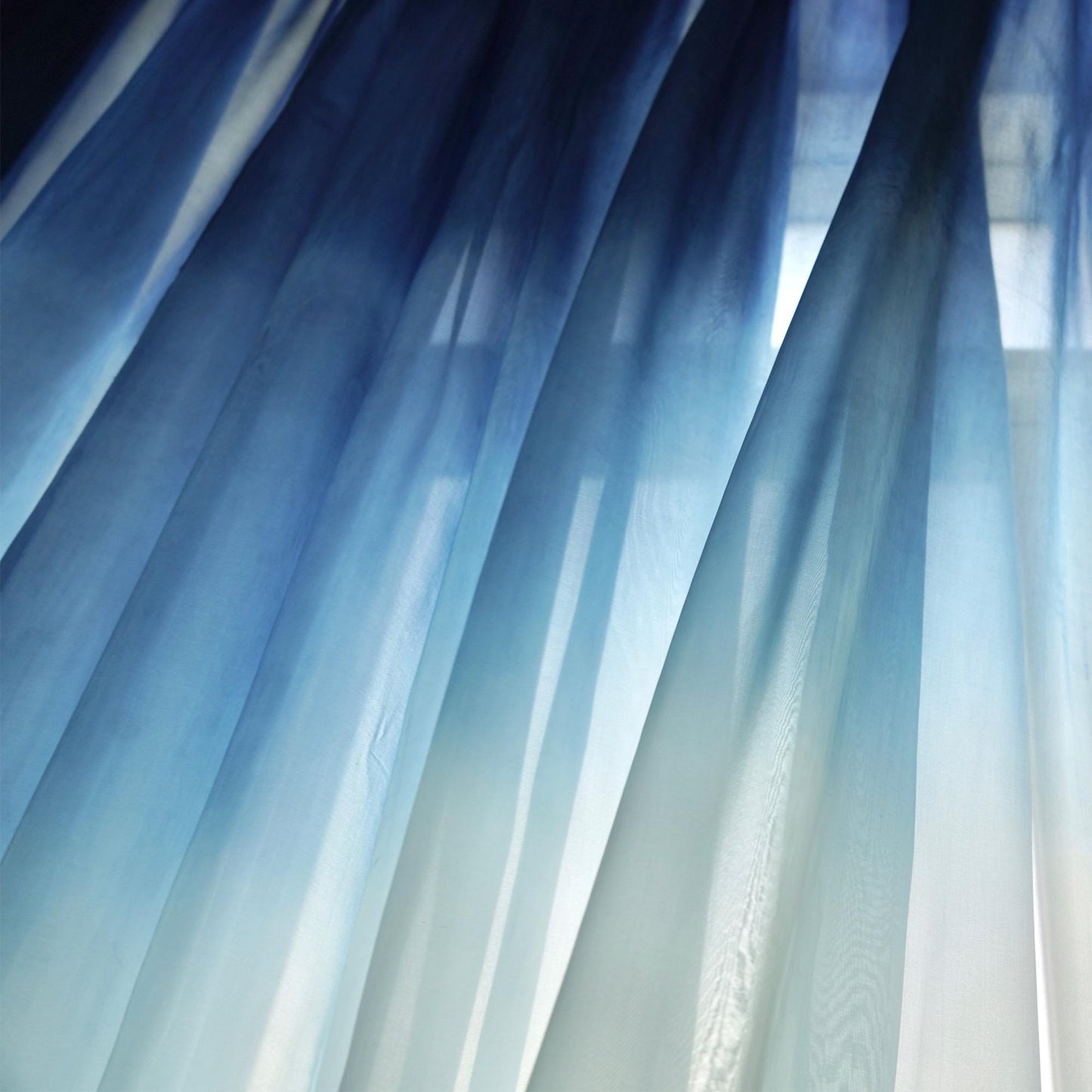 alternate interior view with Sheer Curtain — Indigo Flow filtering soft daylight