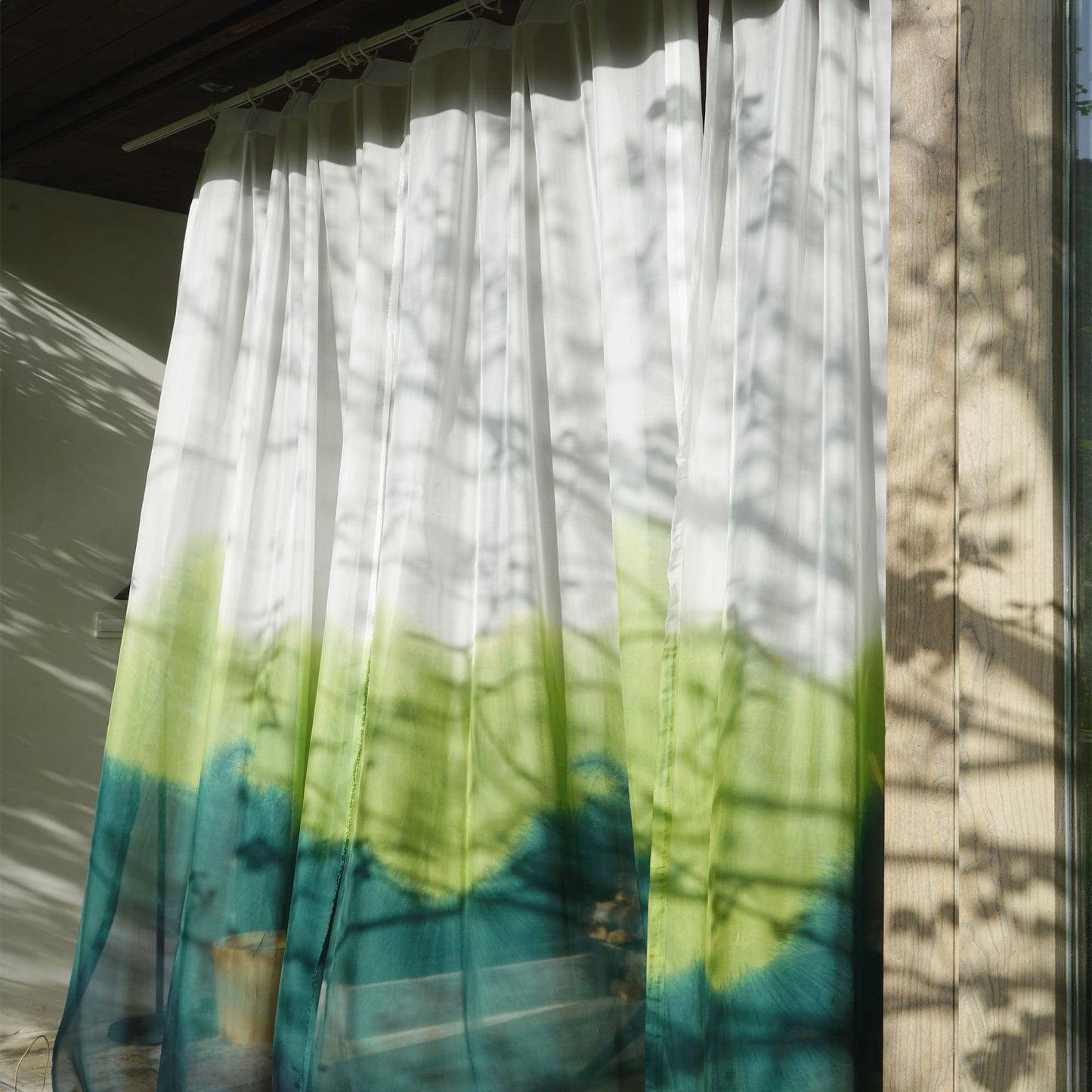 Sheer Curtain — White Green hung as window curtains in a bright room