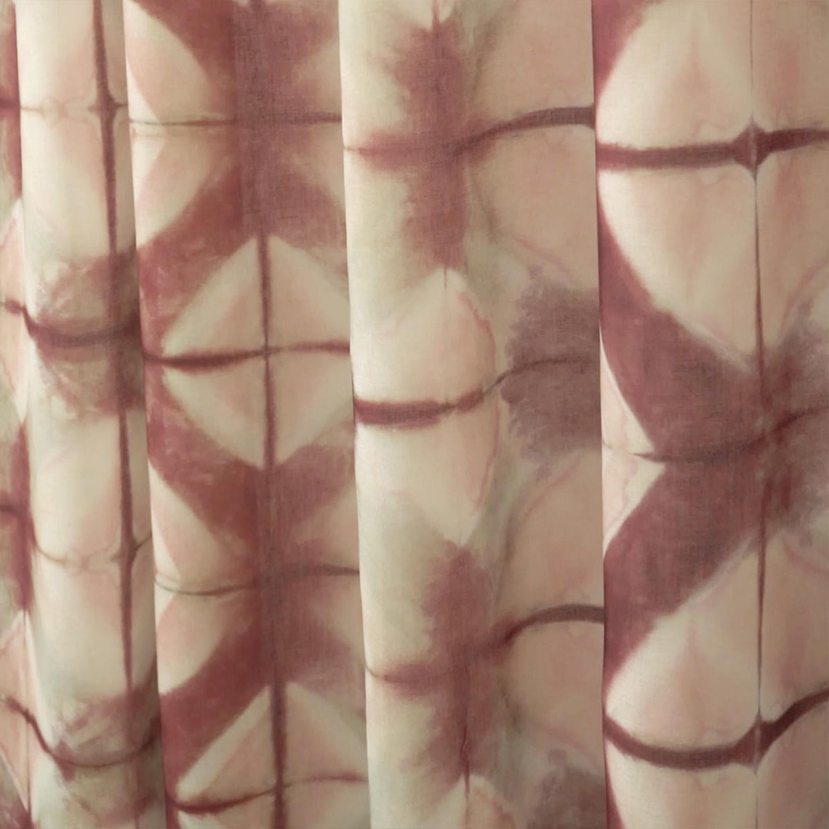 detail view of Pattern Drapery — Dusty Rose showing plant-dyed pattern and sheer drape