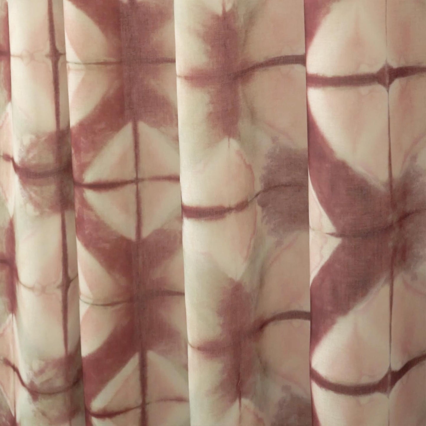 detail view of Pattern Drapery — Dusty Rose showing plant-dyed pattern and sheer drape