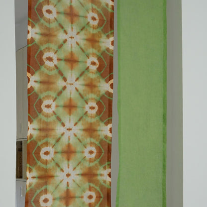 close-up of Motif Linen Noren — Green Bloom showing the natural resist-dye motif on linen