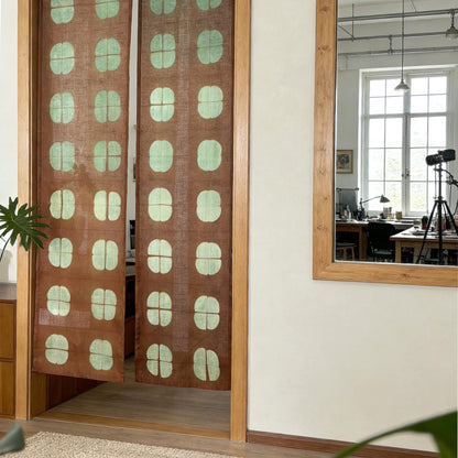 detail view of Motif Linen Noren — Amber Grid showing plant-dyed linen texture and pattern