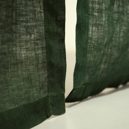 close-up of Soft Tone Noren — Sage Green showing the natural resist-dye motif on linen