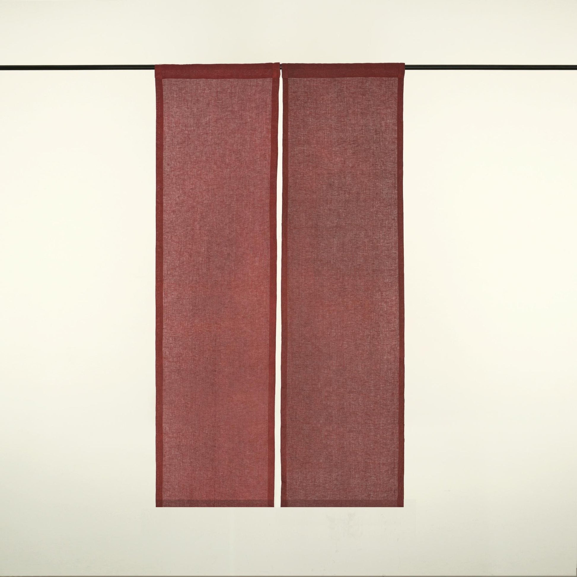 Minimalist Japanese noren 'Dusty Rose' — soft handmade plant-dyed linen doorway curtain.