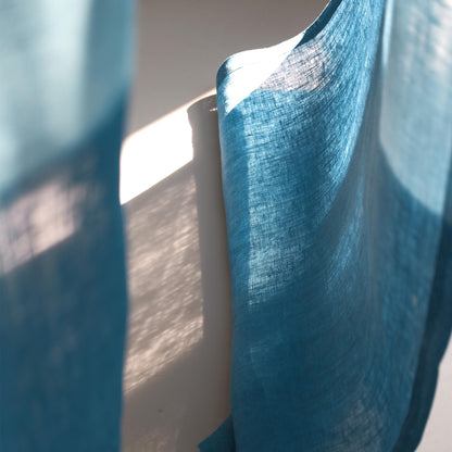 styled room scene with Soft Tone Noren — Mist Blue used as a window or doorway curtain