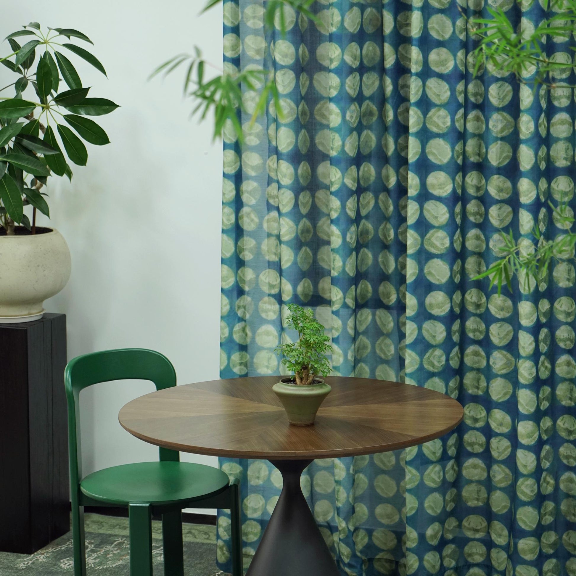 detail view of Pattern Drapery — Green Ochre showing plant-dyed pattern and sheer drape