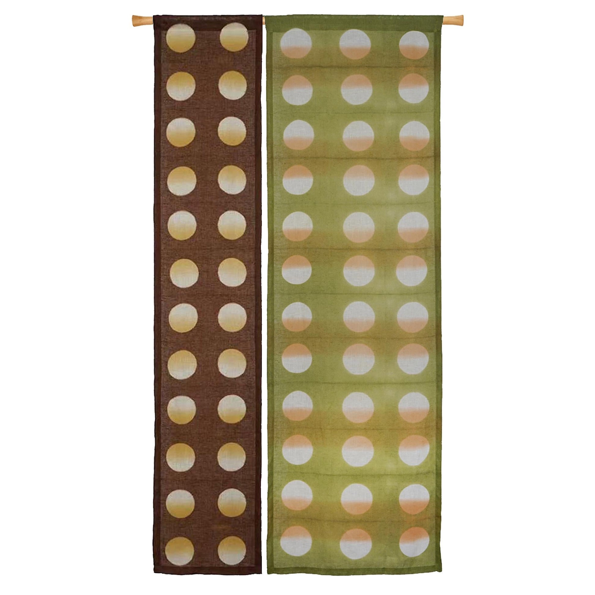 alternate angle of Polka Dot Linen Noren — Orange / Yellow hanging as a two-panel doorway curtain