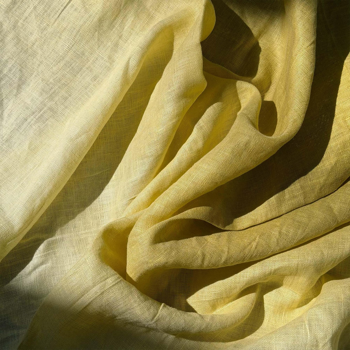 detail view of Soft Tone Noren — Yellow White showing plant-dyed linen texture and pattern