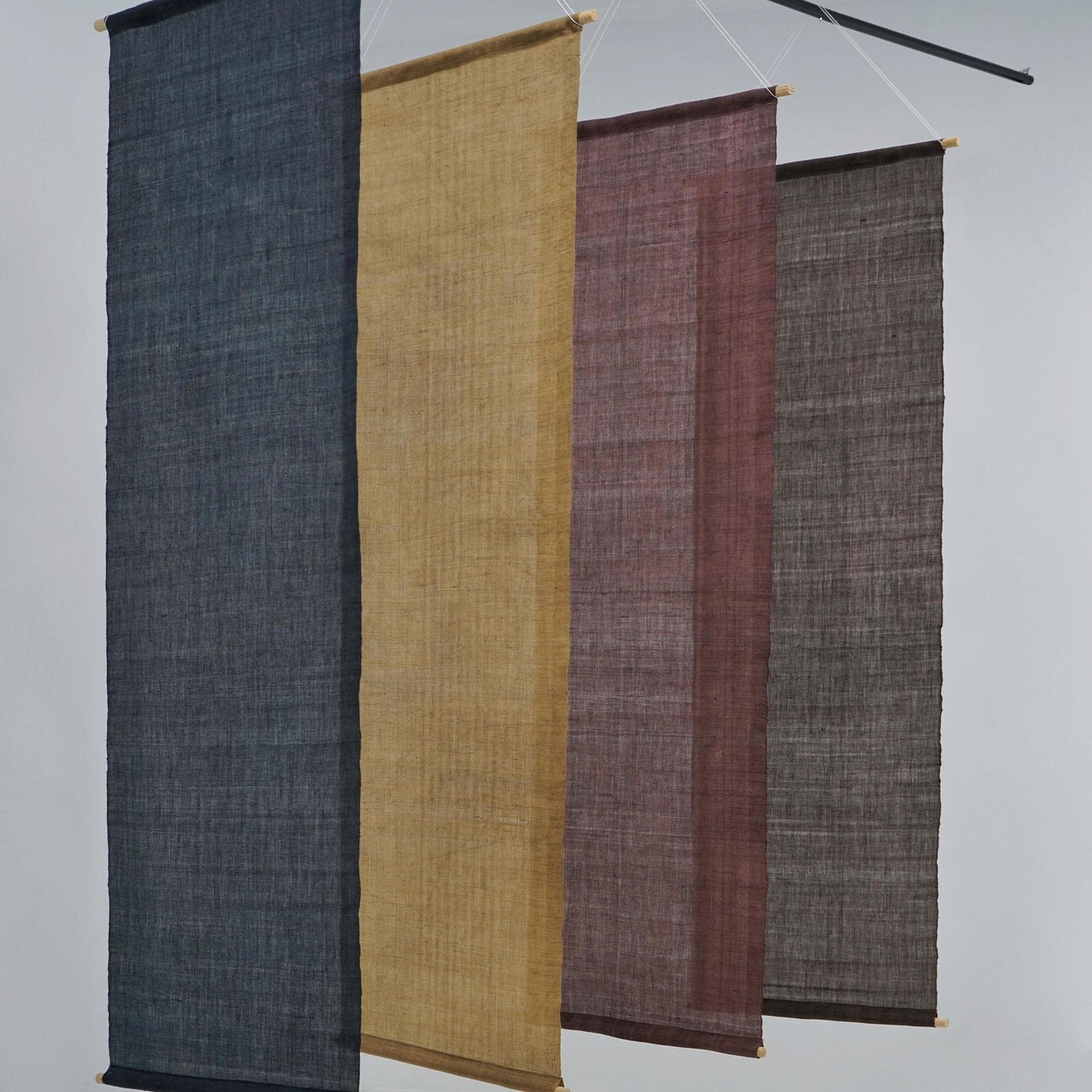 close-up of Ramie Ombre — Plum Grey showing natural dye and weave