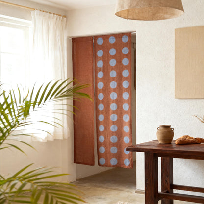 styled room scene with Polka Dot Linen Noren — Brick / Red used as a window or doorway curtain
