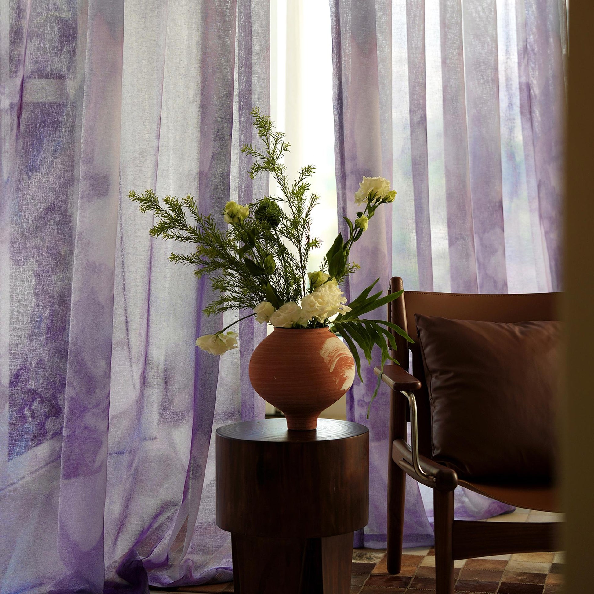 lifestyle scene with Pattern Drapery — Purple Haze creating a soft, airy room partition