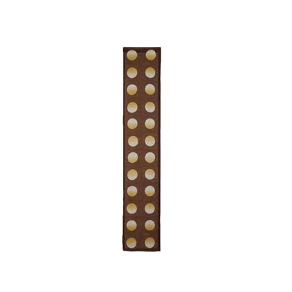 alternate angle of Polka Dot Linen Noren — Ochre / Brown hanging as a two-panel doorway curtain