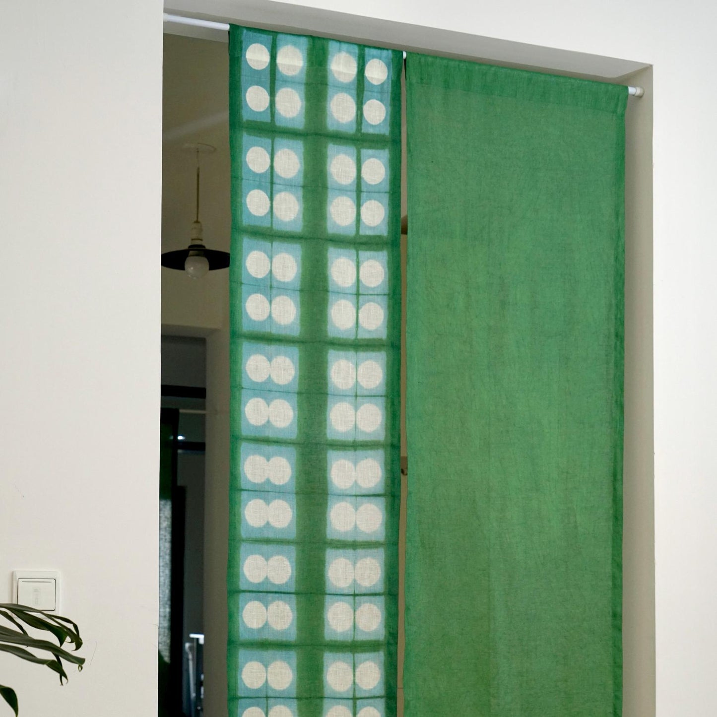 detail view of Motif Linen Noren — Soft Moss showing plant-dyed linen texture and pattern