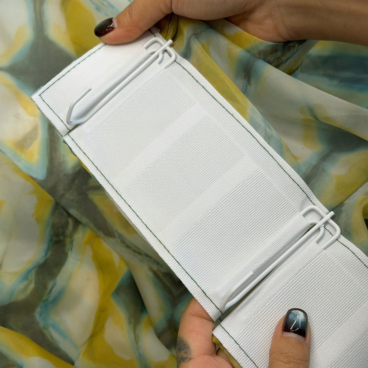 detail view of Pattern Drapery — Moss Yellow showing plant-dyed pattern and sheer drape