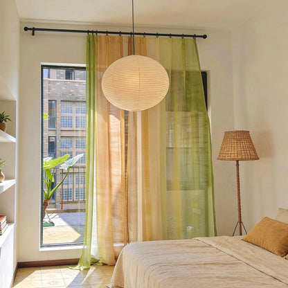 detail view of Sheer Curtain — Orange Green showing natural ramie texture and color