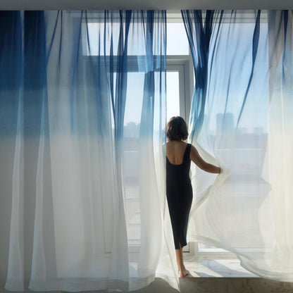 Sheer linen curtain 'Indigo Flow' — plant-dyed translucent, light-filtering window curtain.