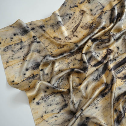 close-up of Scarf — Ochre Vine showing the soft weave and botanical color