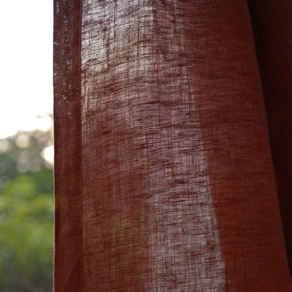 close-up of Soft Tone Noren — Dusty Rose showing the natural resist-dye motif on linen